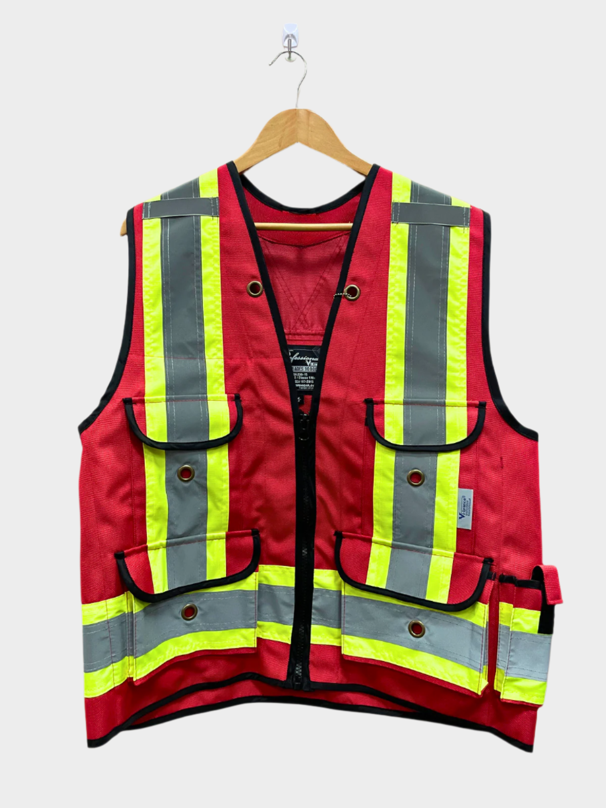 Surveyor Vest in red. High visibility stripes and reflective stripes. Multiple pockets.