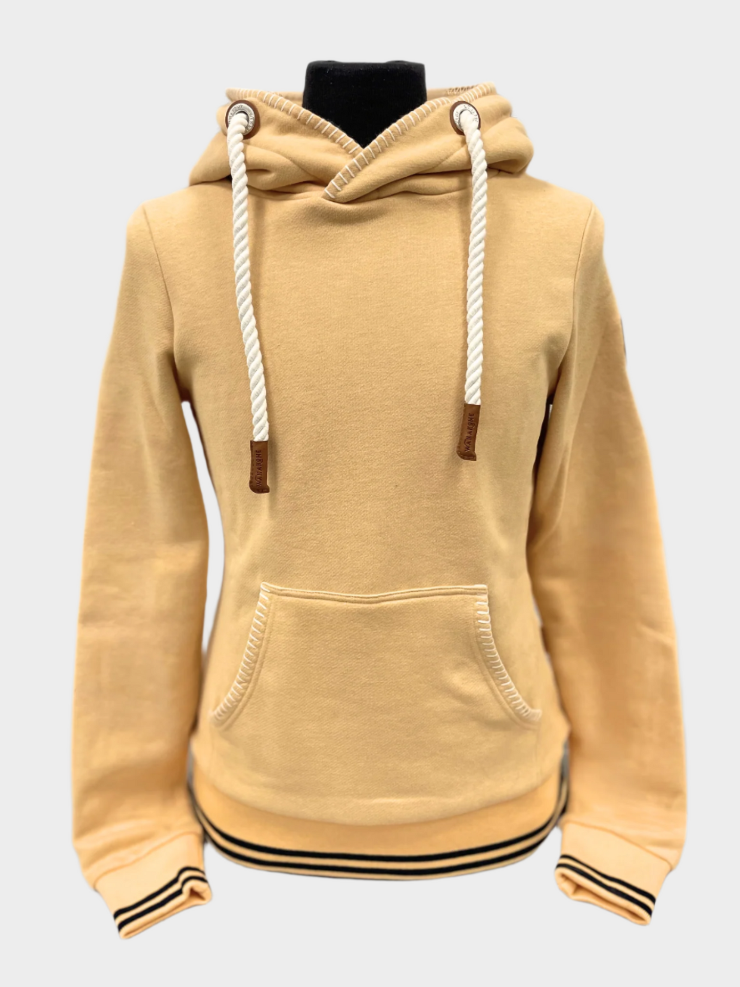 Womens pullover hoodie by Wanakome. Shown in apricot. Blanket stitching on hood and front pocket.