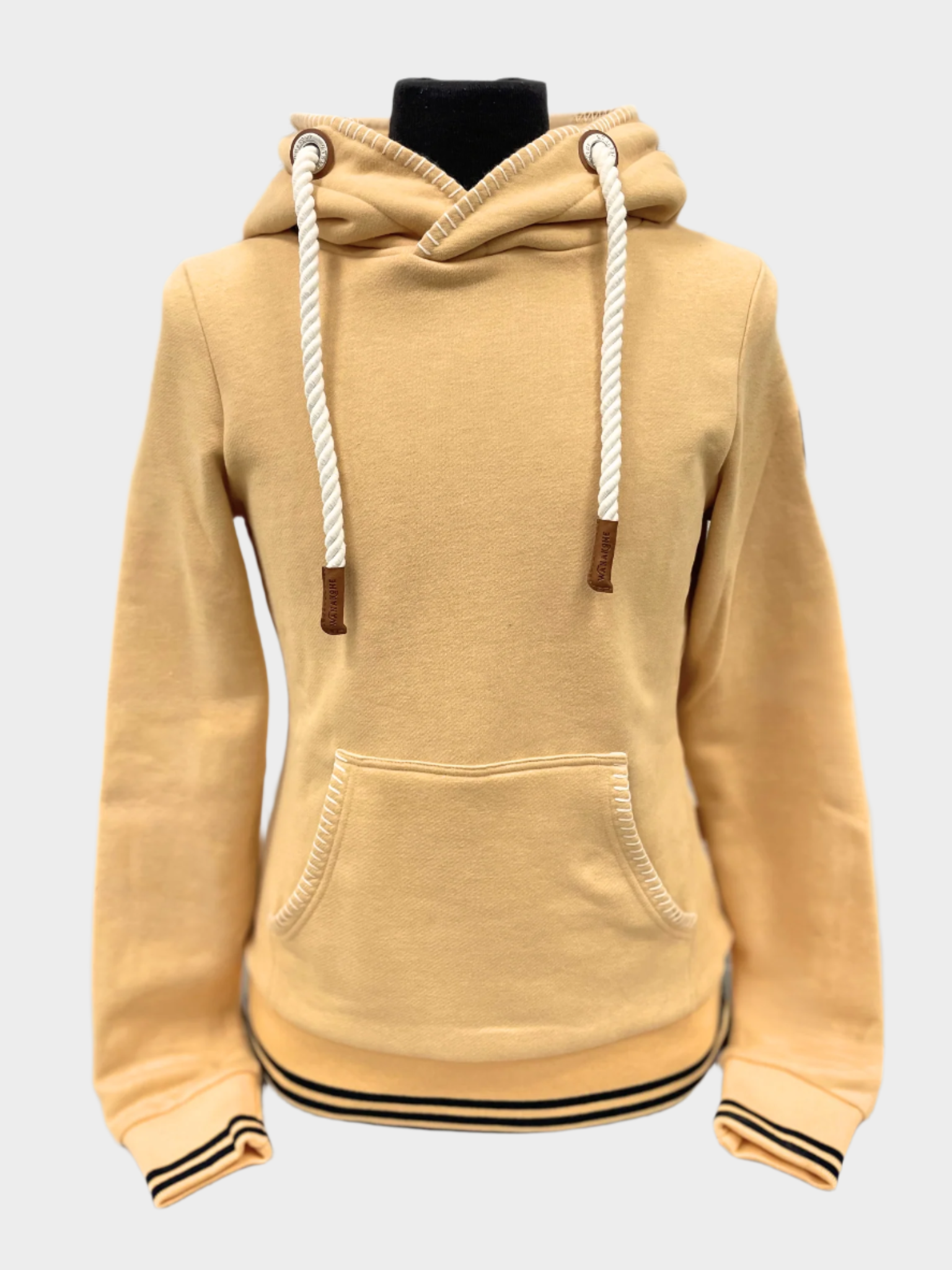 Womens pullover hoodie by Wanakome. Shown in apricot. Blanket stitching on hood and front pocket.