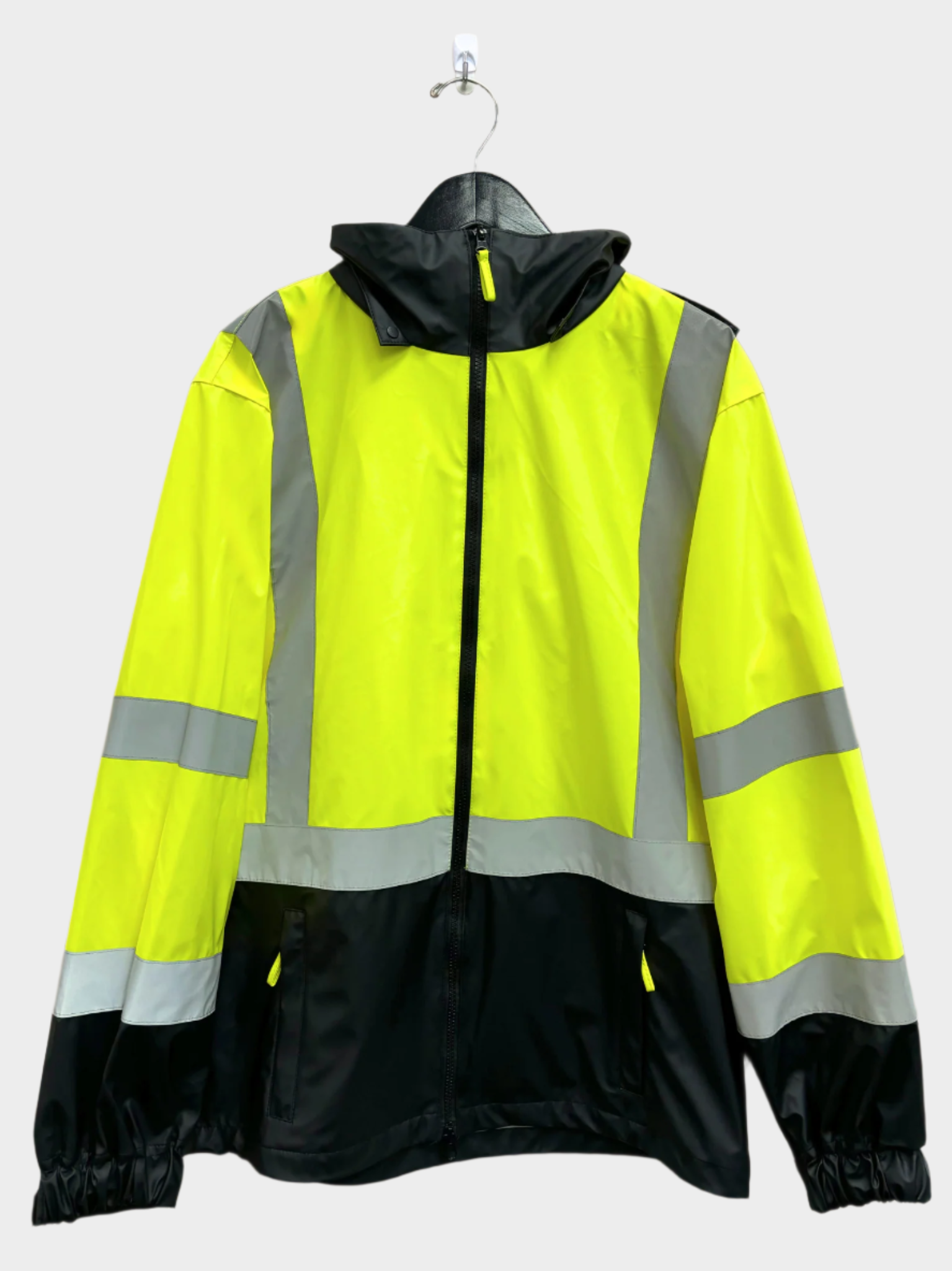 Mens safety windbreaker waterproof shell with a full zip and ood. Has a pocket on each side, elastic wrist cuffs. Features reflective strips.