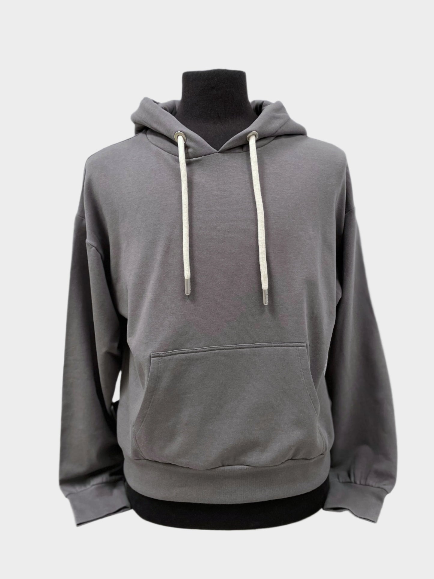 a lightweight womens pullover hoodie with a front pocket, drawstrings with metal caps, and banded wrist cuffs and bottom hem. Shown in grey.