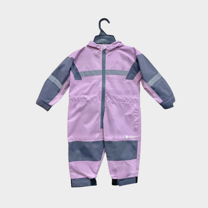 Kids rain suit with attached hood, grey color blocking on top of arms and across shins with safety reflective strips. Shown in lavender, a light pink.