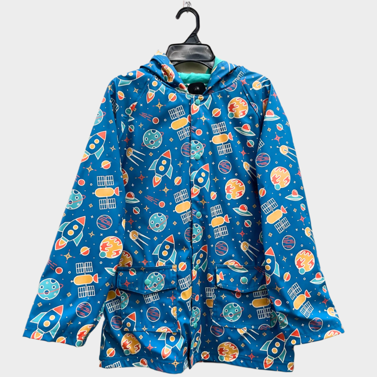 Kids lined rain jacket with buttons in space print. 