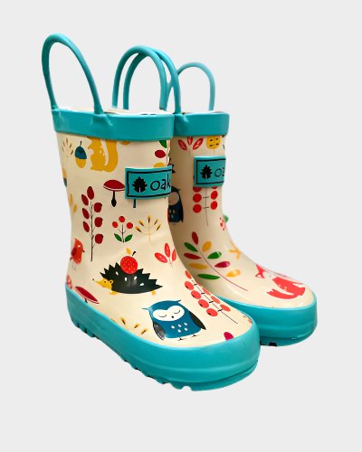 Kids rubber rain boots with forest animals pattern and cream background rubber and oaki logo. Black tread and loop handles.