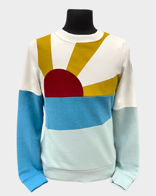 womens pullover crew neck sweater with red, yellow, dark and light blue sunset. 