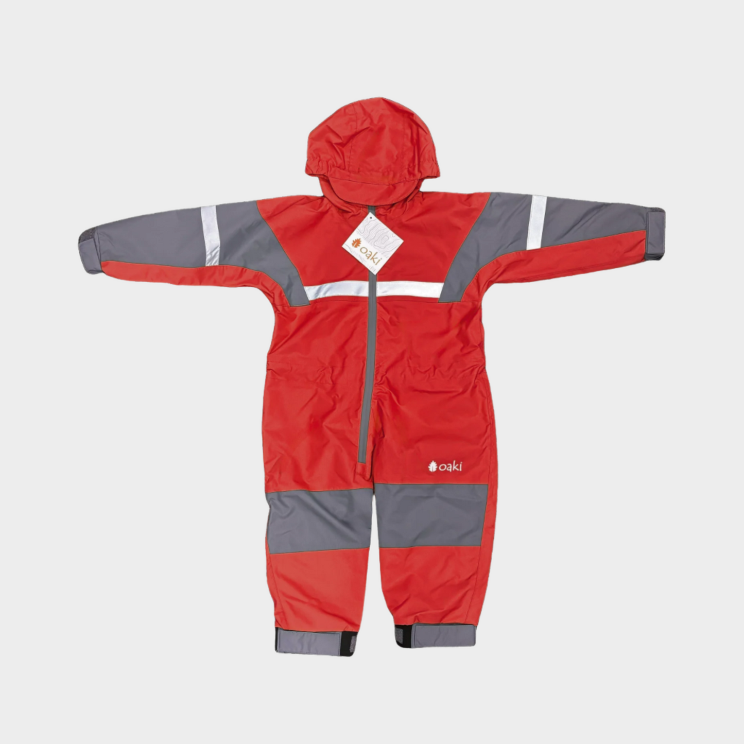 Kids rain suit with attached hood, grey color blocking on top of arms and across shins with safety reflective strips. Shown in fiery red.