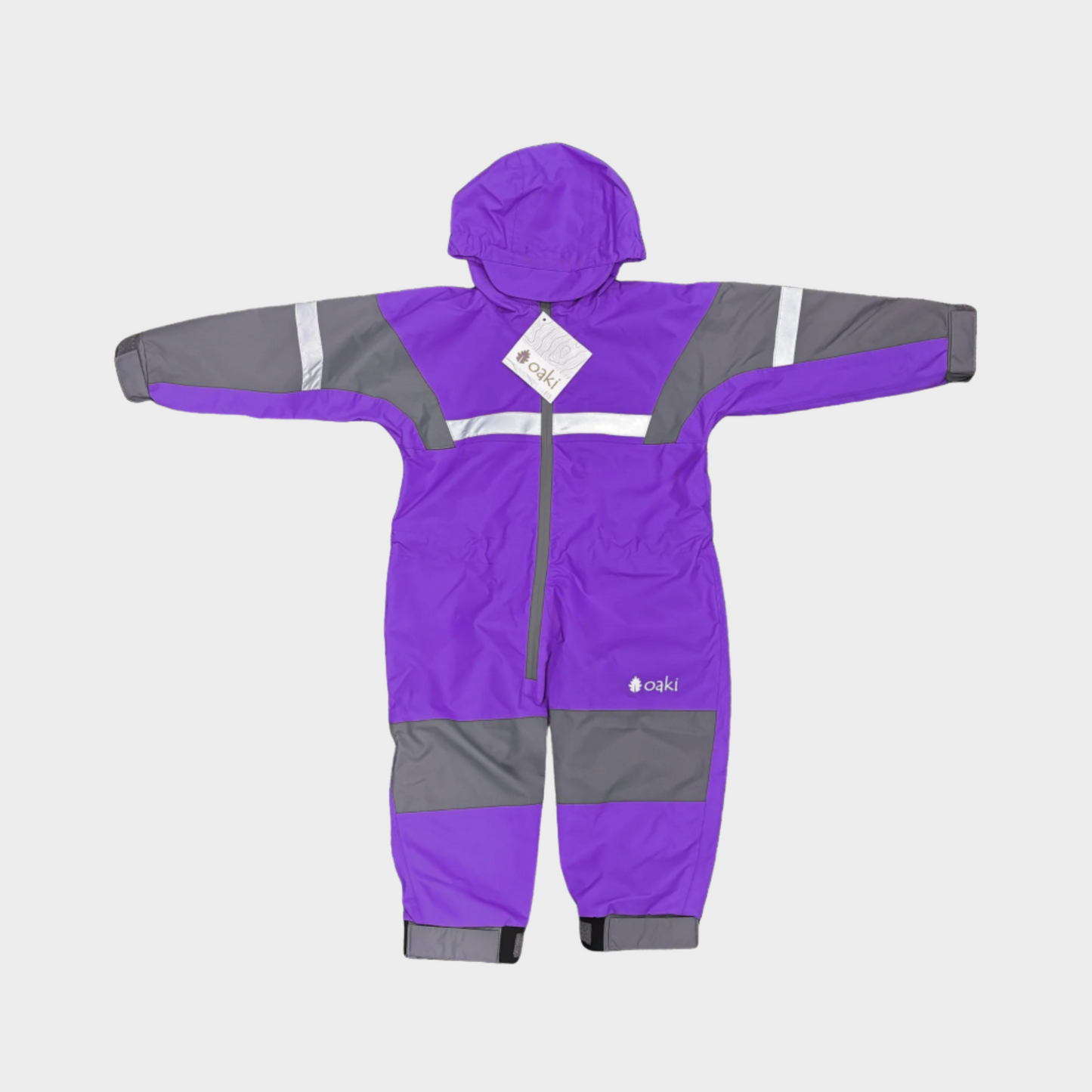 Kids rain suit with attached hood, grey color blocking on top of arms and across shins with safety reflective strips. Shown in purple.