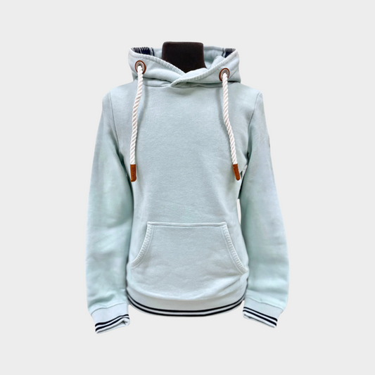 Womens pullover hoodie by Wanakome. Shown in a light blue. Blanket stitching on hood and front pocket.